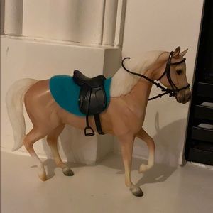 Toy horse with tack